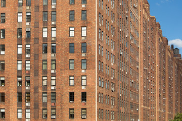 Tall bricks building facade, Manhattan, NYC, USA