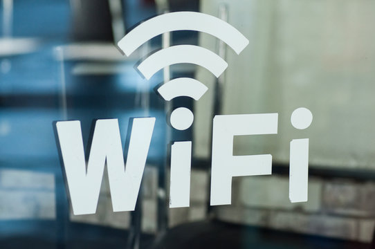closeup of wifi logo on cafe window