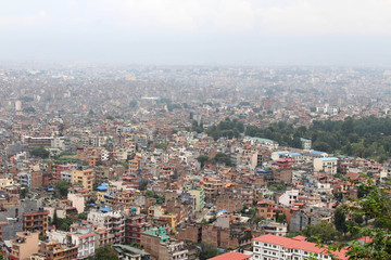 Fototapeta na wymiar Kathmandu city, seen from the Swayambhunath Stupa on the hill