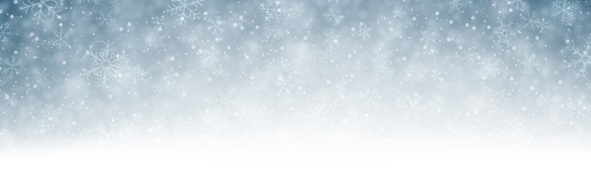 Grey blurred winter banner with snow.