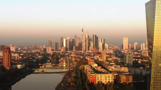 Frankfurt ECB Skyline Aerial Shot at early sunrise reflecting sun