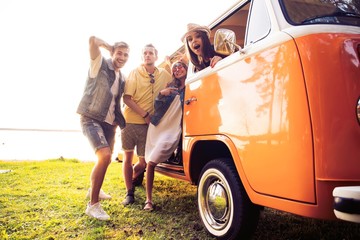 summer holidays, road trip, vacation, travel and people concept - smiling young hippie friends...