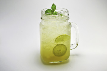 Glass of Lemonade Isolated Photography. Cold Fresh Drink Lime and Mint