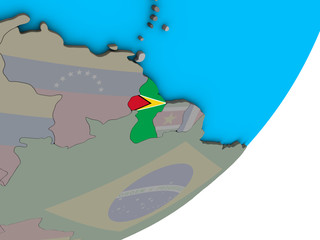 Guyana with national flag on blue political 3D globe.