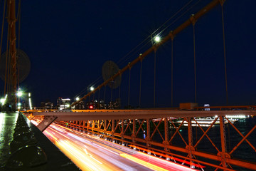 Fototapeta na wymiar New York skyline view from the Brooklyn Bridge at night, Manhattan buildings and skyscrapers
