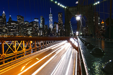 Fototapeta na wymiar New York City skyline view from the Brooklyn Bridge at night, Manhattan buildings and skyscrapers