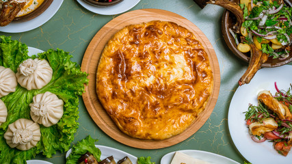 Georgian cuisine foodset from khachapuri, khinkali, pkhali, dolma, satsivi top view