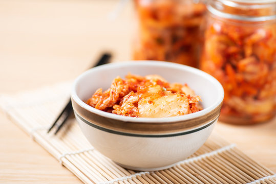 Kimchi cabbage in a bowl and jar (Korean food)
