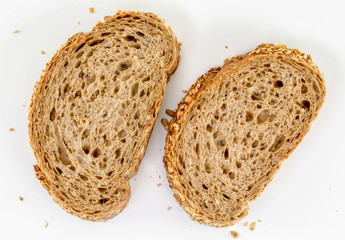 Two slices of brown bread isolated