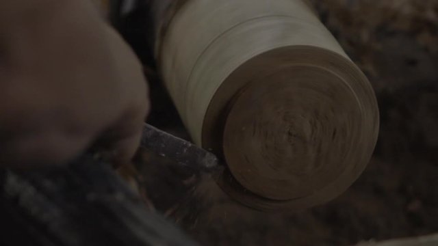 Slow motion shot of woodturning process