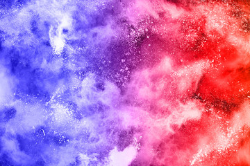Fototapeta premium abstract colored dust explosion on a black background.abstract powder splatted background,Freeze motion of color powder exploding/throwing color powder, multicolored glitter texture.