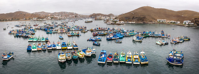 Fisher boats in the harbor. Pucusana, Lima, Peru. - obrazy, fototapety, plakaty