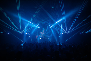 Fototapeta na wymiar blue laser show concert