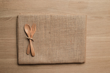 wooden table top with Kitchen ware for background