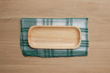 wooden table top with Kitchen ware for background