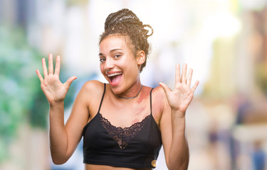 Young braided hair african american with pigmentation blemish birth mark over isolated background...