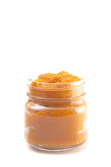 Glass Canning Jar Filled with Orange Vegetable Puree
