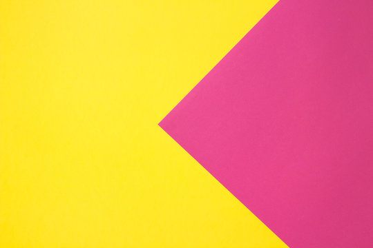 flat composition. Pink and yellow colors. Large arrow