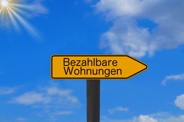 Ein Schild weist auf bezahlbare Wohnung hin