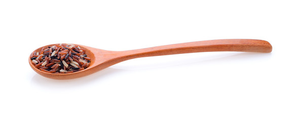 riec on wood spoon on white background.