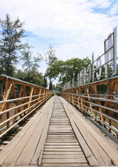 Fototapeta na wymiar old wood bridge landmark in south Thailand