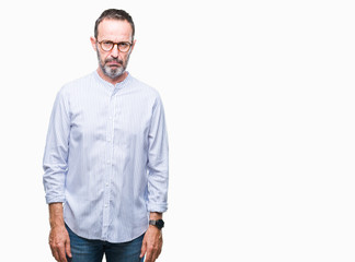 Fototapeta premium Middle age hoary senior man wearing glasses over isolated background skeptic and nervous, frowning upset because of problem. Negative person.