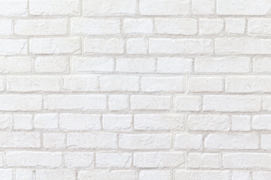 close up of weathered white brick wall texture background.