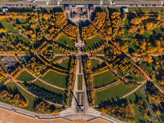 Park 300 years of St. Petersburg. Art landscape design. Labyrinths trees and bushes with yellowing autumn foliage. Radial crossing roads. view from top .
