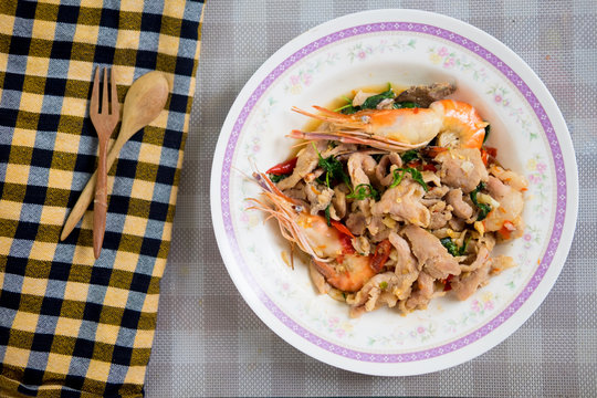 Stir-fried of pork and shrimp mix with basil leaf