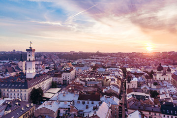 aerial view of sunset above european city
