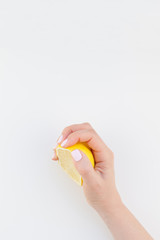 Fototapeta premium Woman hand with lemon