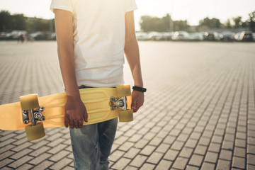 Cute Little Guy with Skateboard in Hand © Romvy