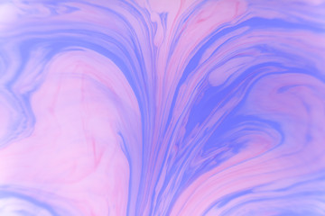 Abstract violet marble background. Stains of paint on the water.