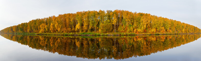 Fototapeta premium Autumn scene. Fall trees with reflection in a lake