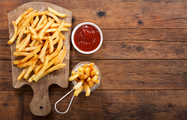 French fries with ketchup, top view