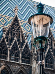 Fototapeta na wymiar Lamp post in Vienna old town