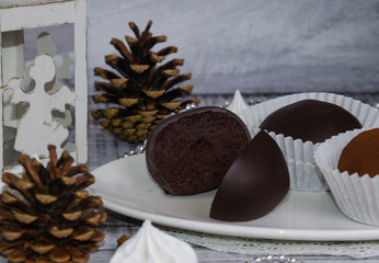 New year chocolate potato cake on wooden background