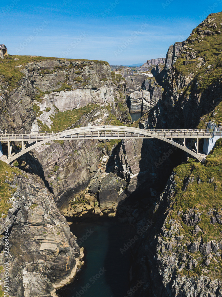 Wall mural Aerial view of Bridge to Mizen Head lighthouse in southern Ireland