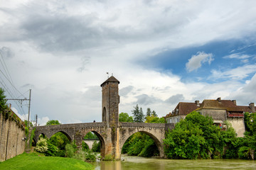 medieval bridge over river Gave de Pau in Orthez - France