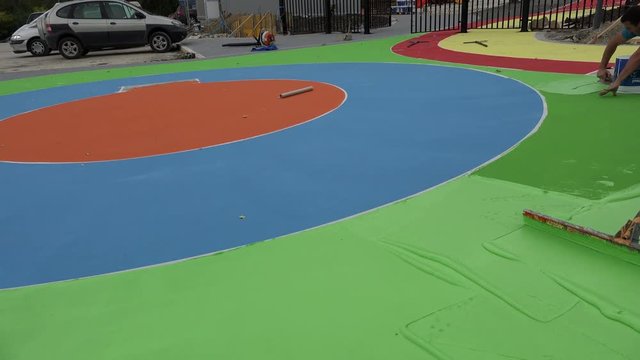 Painting playground. Creating attraction in the playground. Handmade.