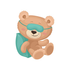 Fototapeta premium Cute teddy bear in sleeping mask dreaming on pillow. Plush toy. Flat vector element for children book