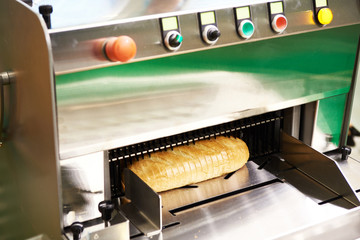 Sliced bread in cutting machine