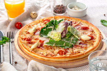 Delicious fresh pizza served on wooden table