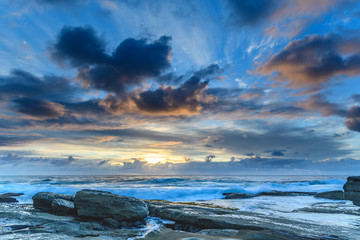 Fototapeta na wymiar An Atmospheric Sunrise Seascape