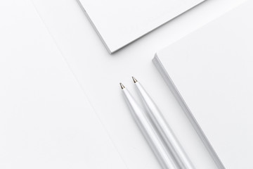 White blank business card. Office table desk with pencil. Top view and copy space for ad text