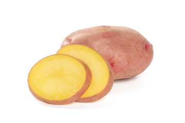 raw potato tuber with slices isolated on white