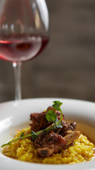 The ossobuco and saffron risotto. Shallow dof