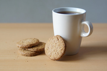 oat biscuits or cookies and a cup of tea