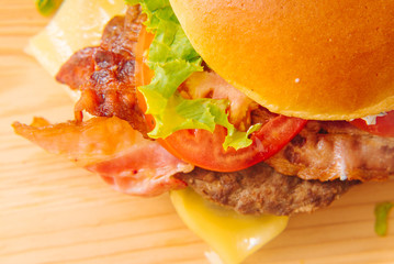 Home made tasty grilled burger on a wooden table