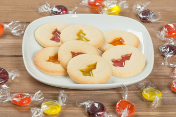 Home Baked Crystal Cookies On White Plates.